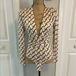 Fashion Nova Cream Bodysuit with Long Sleeves and Notched Collar